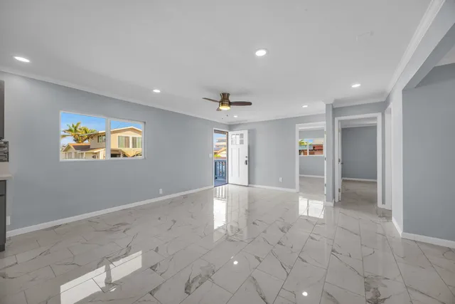 a view of an empty room and window