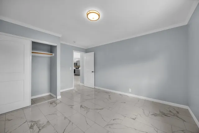 a house with a plant in front of it