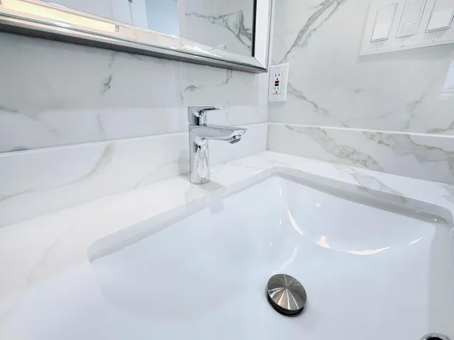 a close view of a bathtub in a bathroom