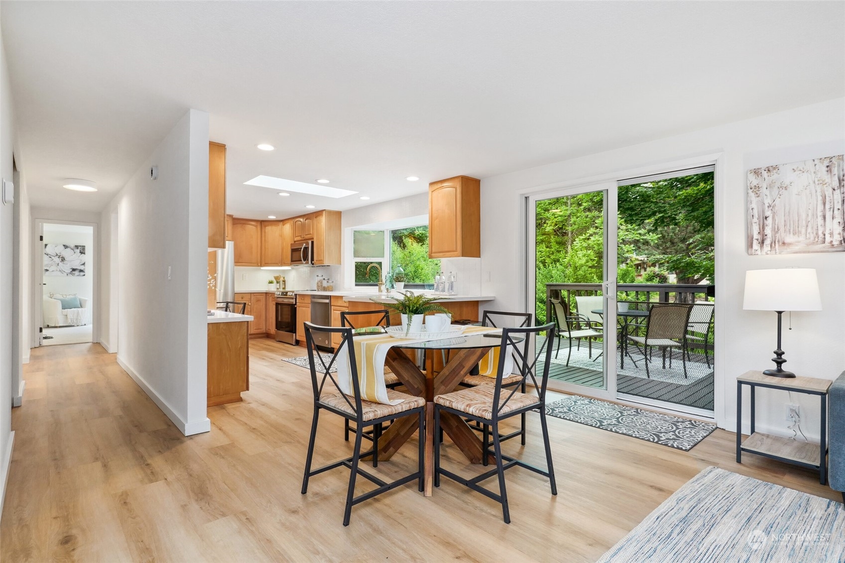24113 10th Place West Bothell, WA 98021 - Photo 11 of 35 a view of a dining room with furniture and wooden floor