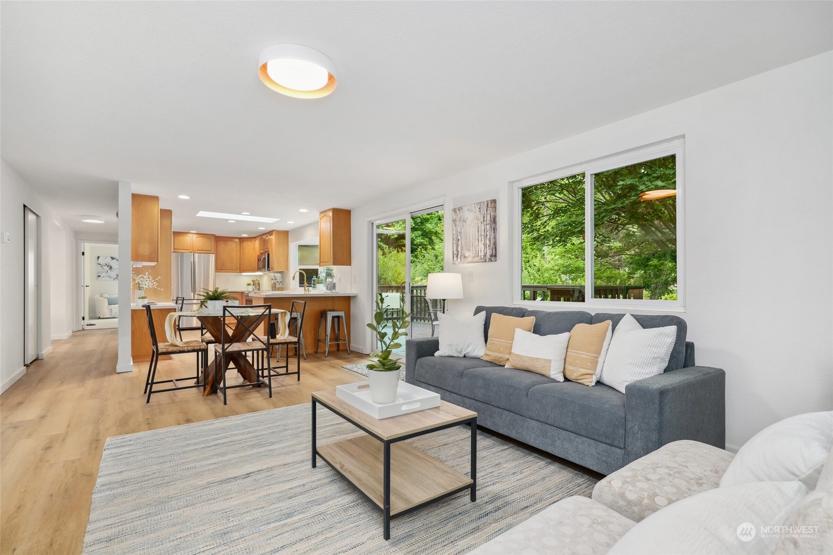 24113 10th Place West Bothell, WA 98021 - Photo 19 of 35 a living room with furniture and large windows