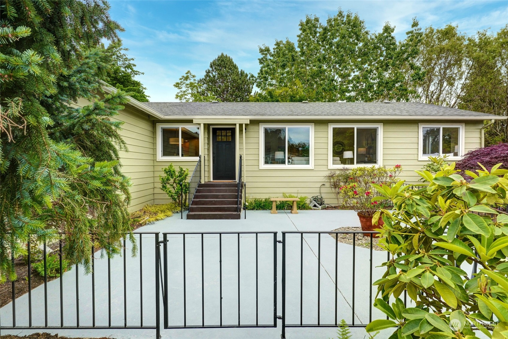 24113 10th Place West Bothell, WA 98021 - Photo 2 of 35 a backyard of a house with seating space
