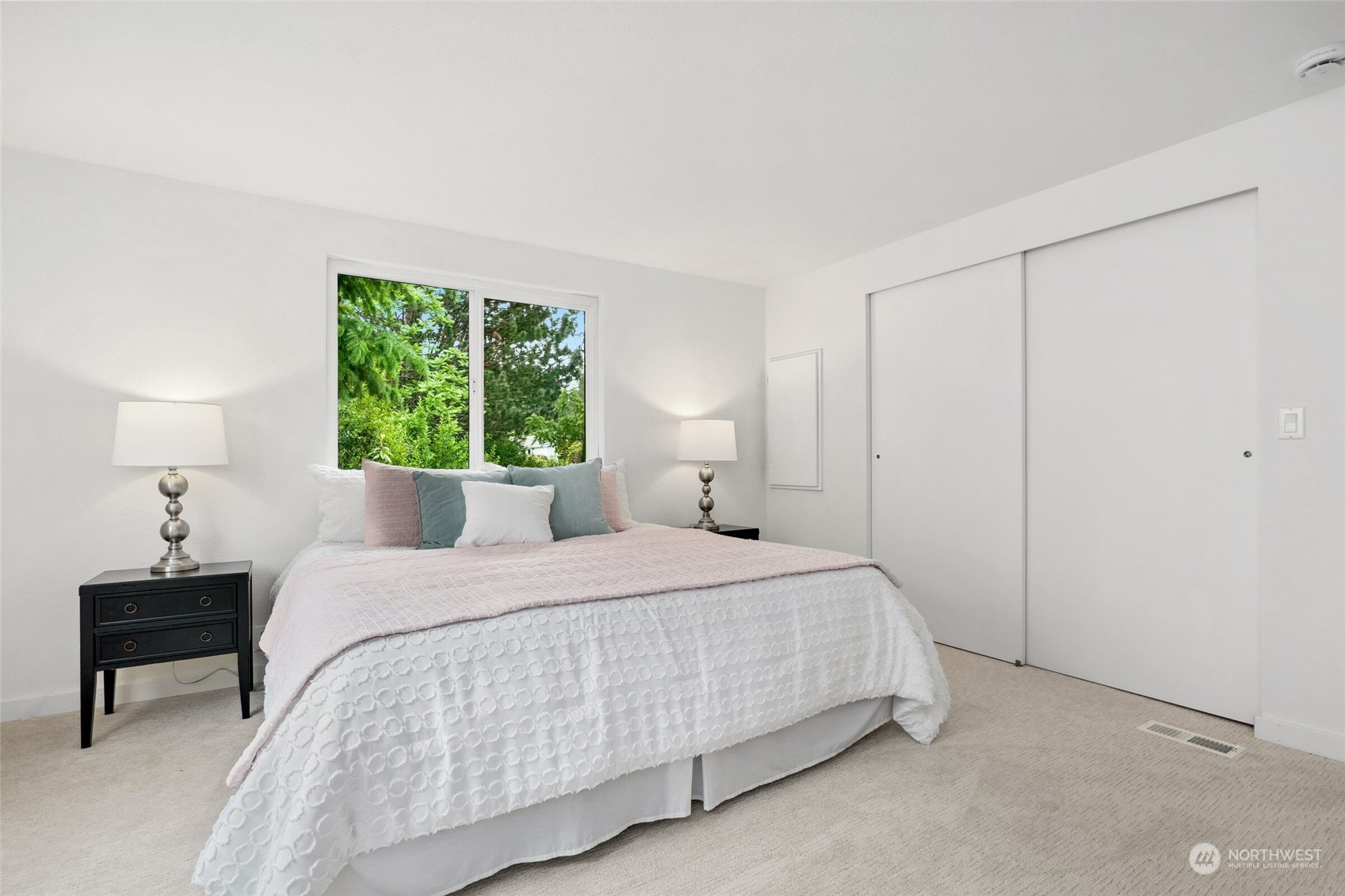 24113 10th Place West Bothell, WA 98021 - Photo 24 of 35 a bedroom with a bed and a table