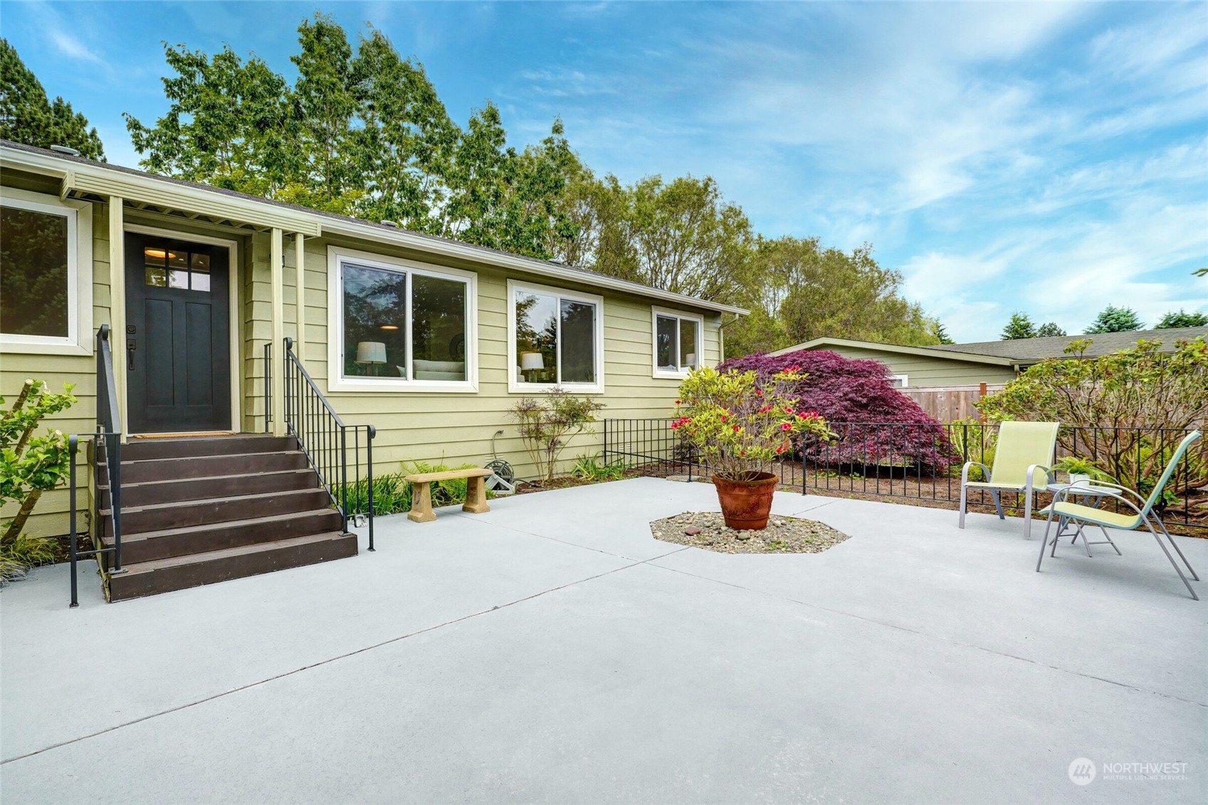 24113 10th Place West Bothell, WA 98021 - Photo 3 of 35 a front view of a house with outdoor seating