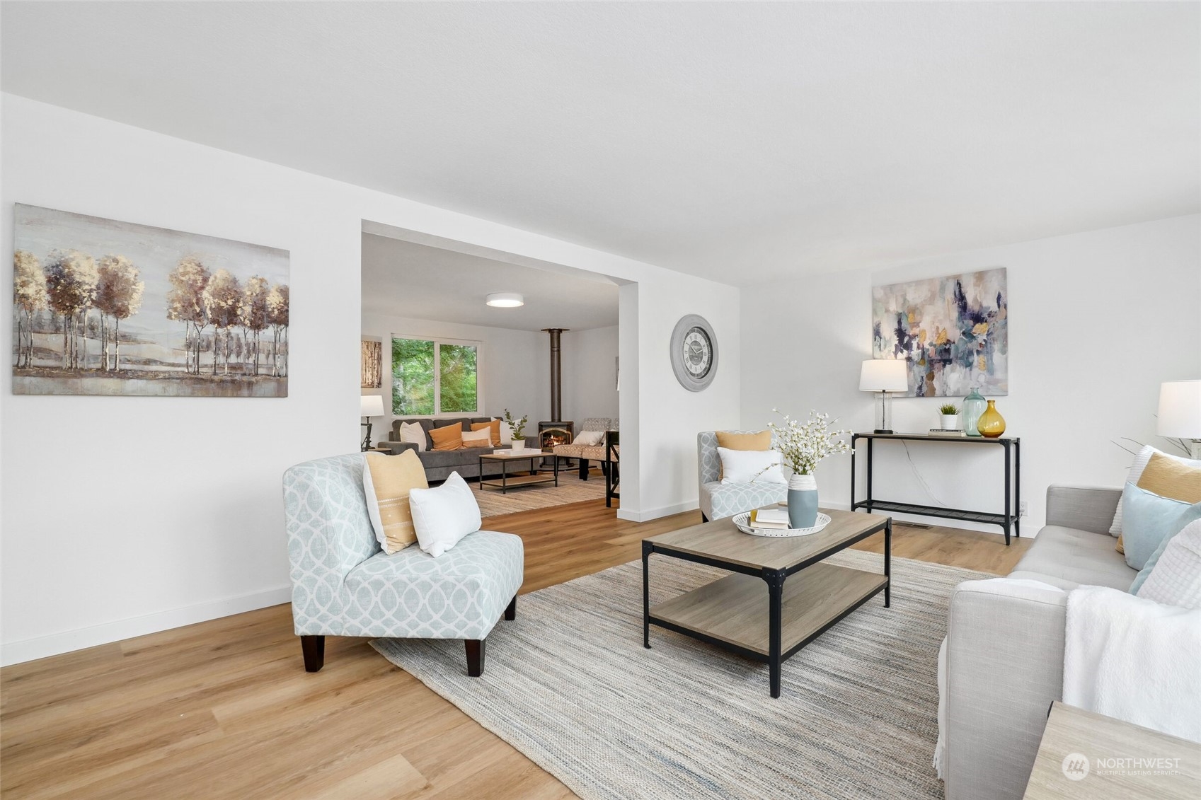 24113 10th Place West Bothell, WA 98021 - Photo 6 of 35 a living room with furniture and a wooden floor