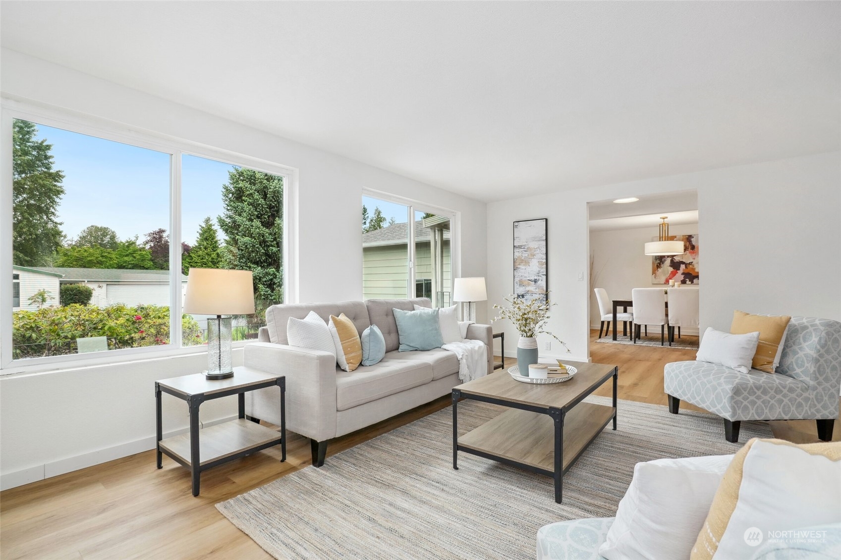 24113 10th Place West Bothell, WA 98021 - Photo 9 of 35 a living room with furniture and a large window