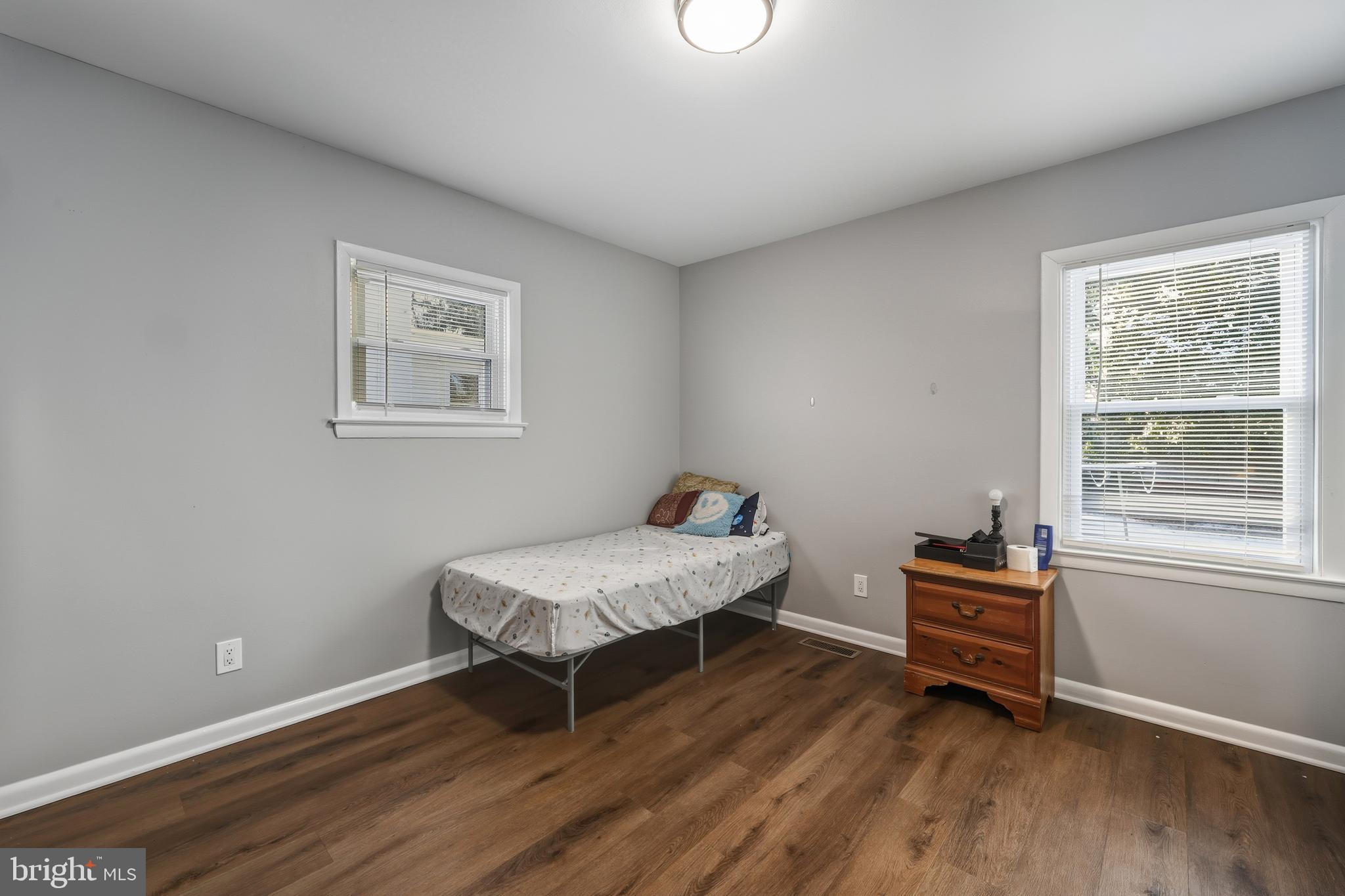 114 Magnolia Avenue Bridgeton, NJ 08302 - Photo 16 of 30 a bedroom with a bed and a window