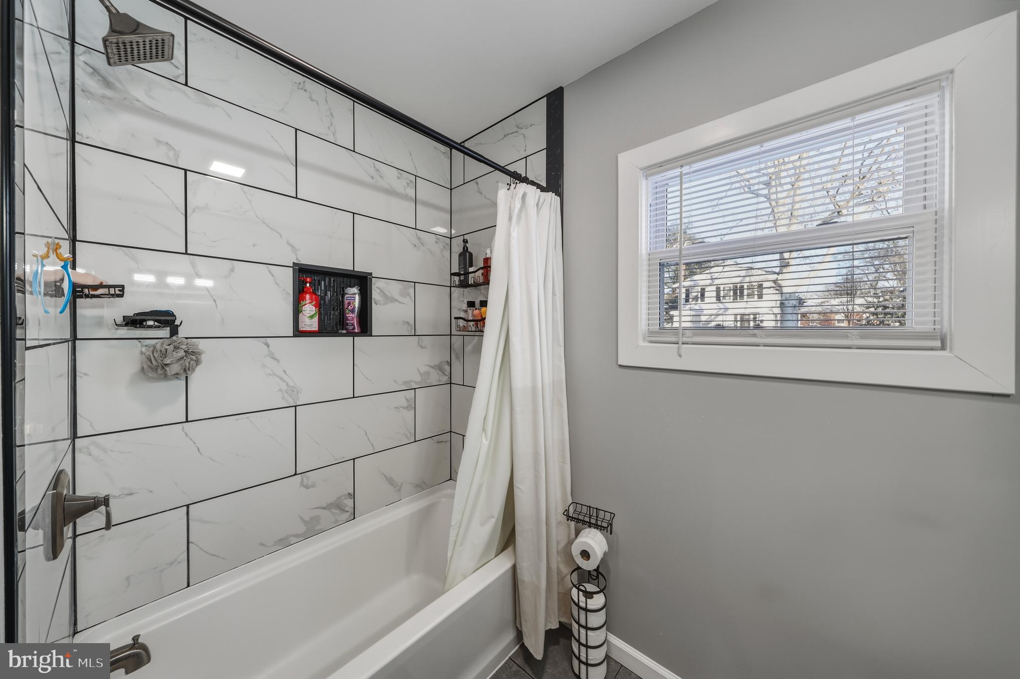 114 Magnolia Avenue Bridgeton, NJ 08302 - Photo 18 of 30 a bathroom with a bathtub and shower