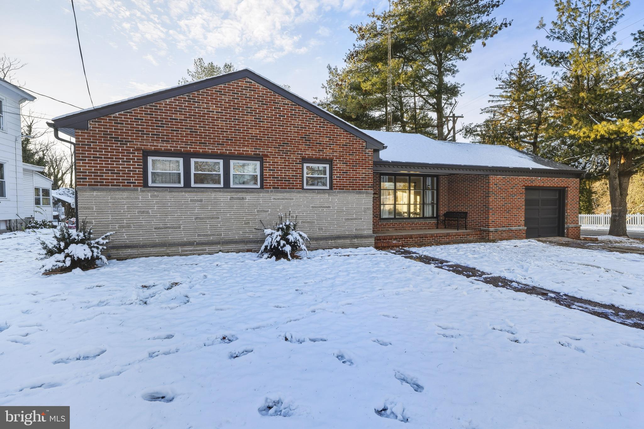 114 Magnolia Avenue Bridgeton, NJ 08302 - Photo 3 of 30 a front view of a house with a yard