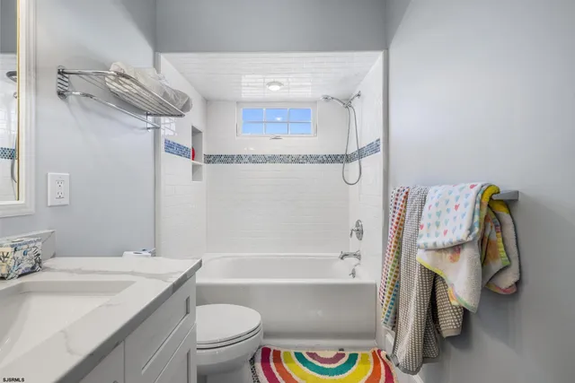 a view of a bedroom from a hallway