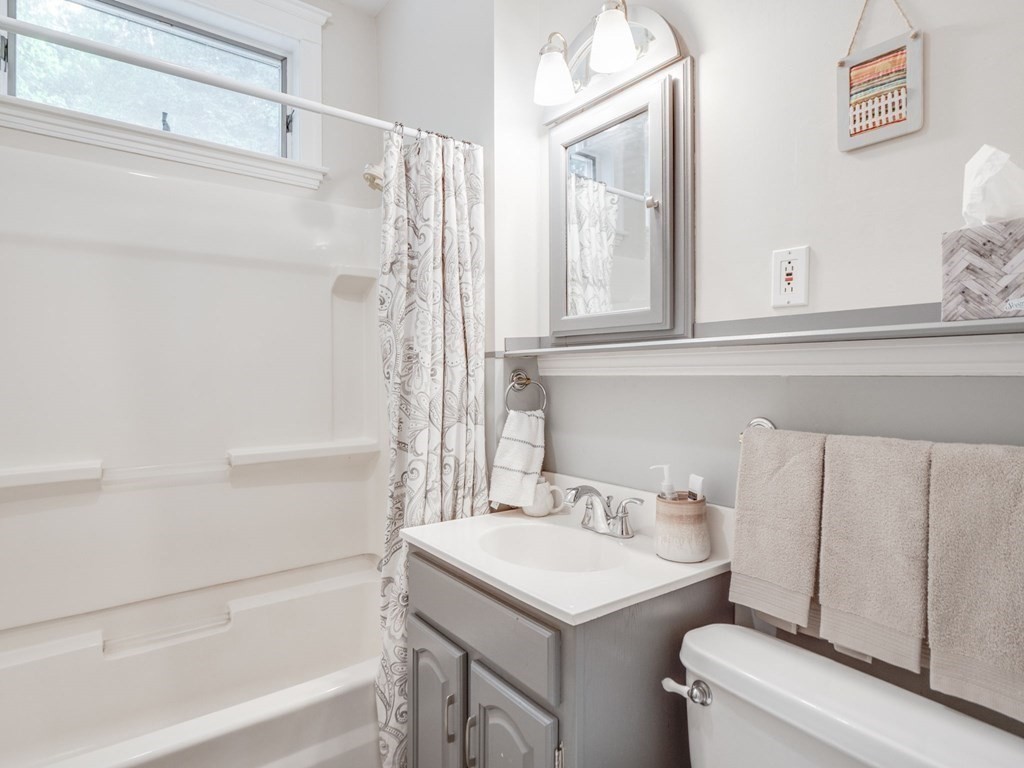 81 Baker Street Boston, MA 02132 - Photo 17 of 42 a bathroom with a sink and a bathtub