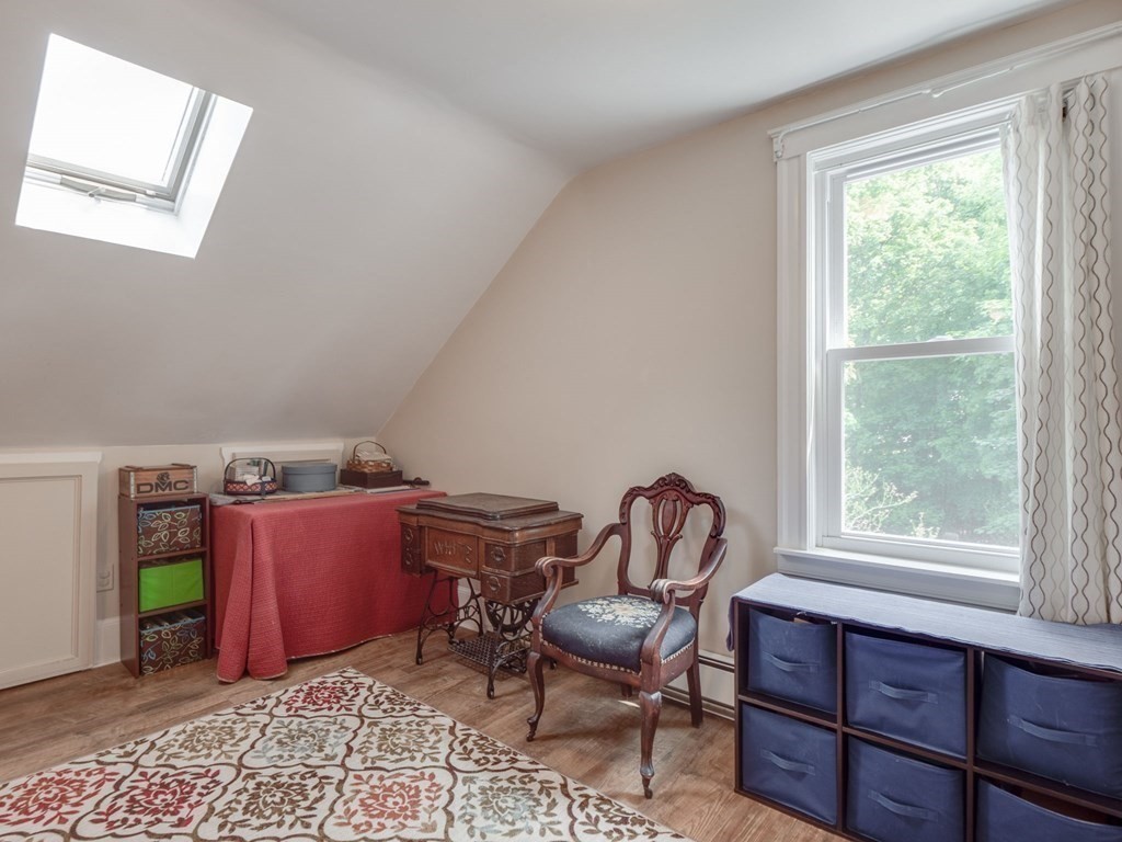 81 Baker Street Boston, MA 02132 - Photo 18 of 42 a room with furniture and a window