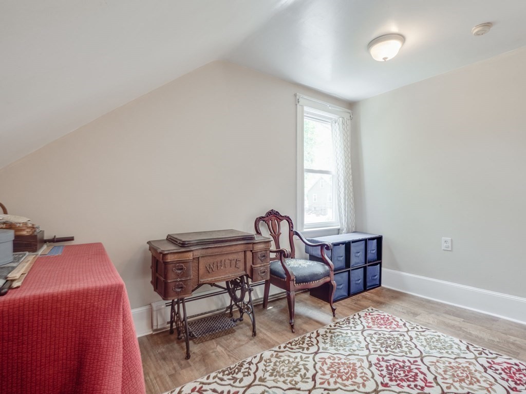 81 Baker Street Boston, MA 02132 - Photo 29 of 42 a room with furniture and windows