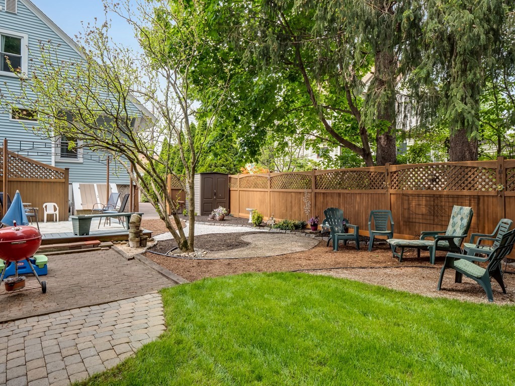 81 Baker Street Boston, MA 02132 - Photo 41 of 42 a view of a backyard with sitting area and furniture
