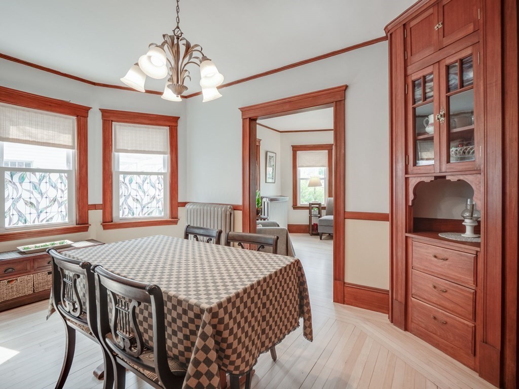 81 Baker Street Boston, MA 02132 - Photo 6 of 42 a bedroom with a bed and a dresser in it