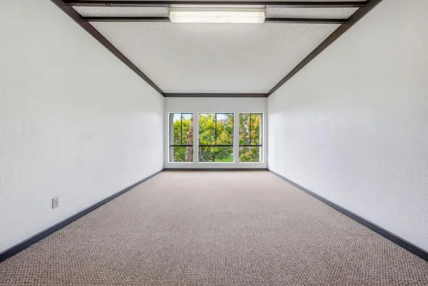 a view of a hallway with closet and entryway