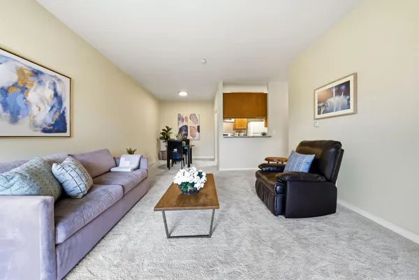 a living room with furniture and a couch