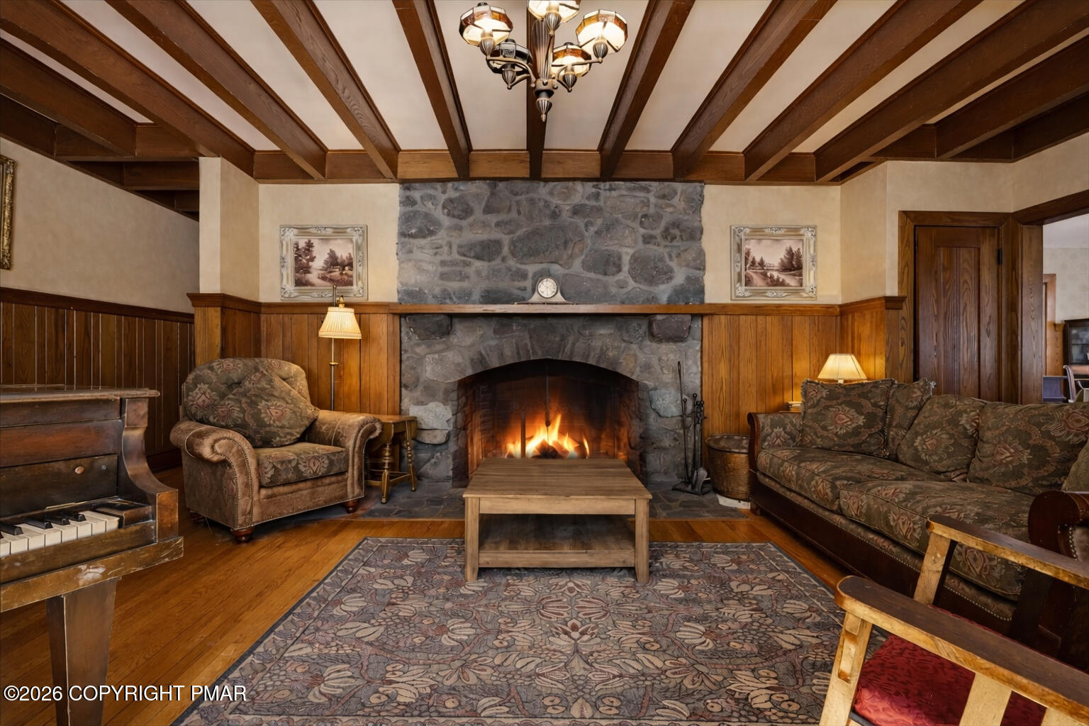 204 Lake Road Swiftwater, PA 18370 - Photo 9 of 76 a living room with furniture and a fireplace