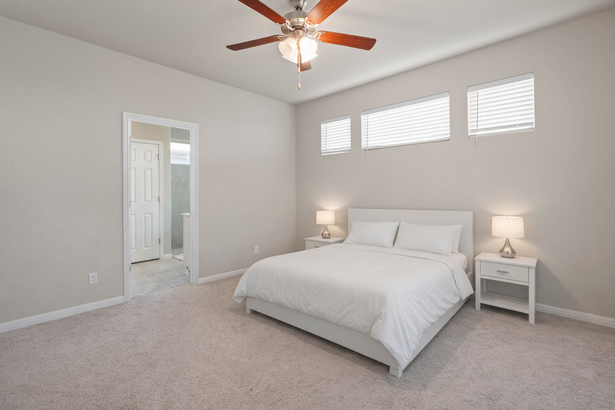 159 MacArthur Drive Leander, TX 78641 - Photo 14 of 31 a bedroom with a bed and window