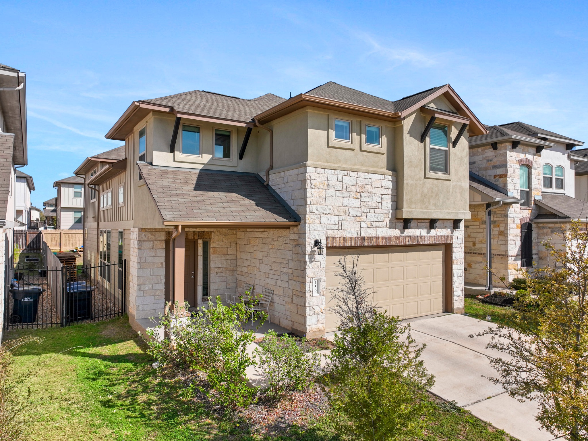 159 MacArthur Drive Leander, TX 78641 - Photo 2 of 31 a front view of a house with a yard