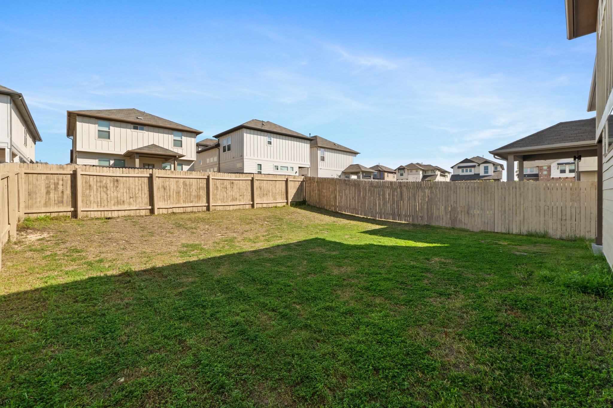 159 MacArthur Drive Leander, TX 78641 - Photo 28 of 31 a view of a house with a yard