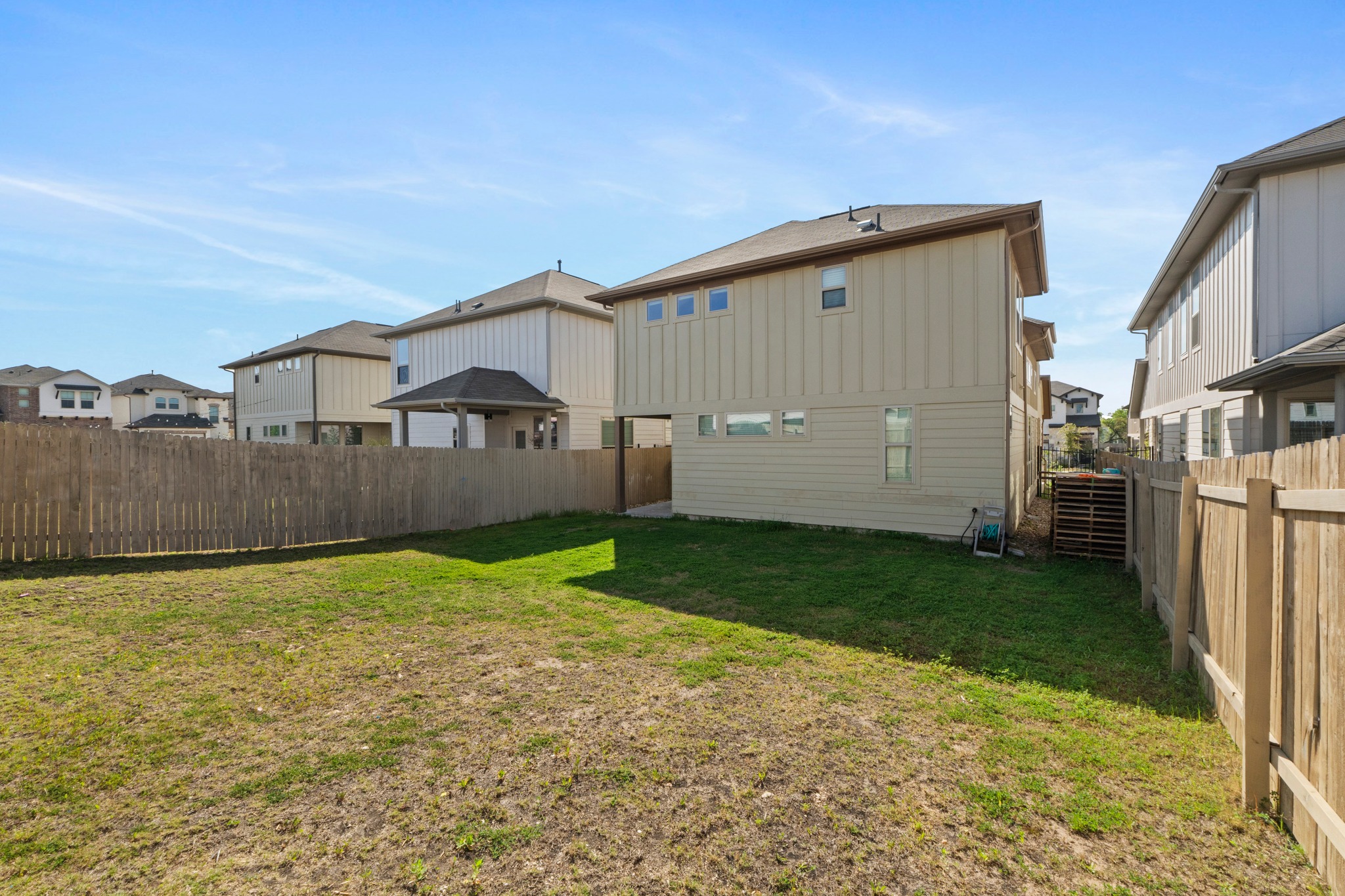 159 MacArthur Drive Leander, TX 78641 - Photo 29 of 31 a view of a back yard of the house