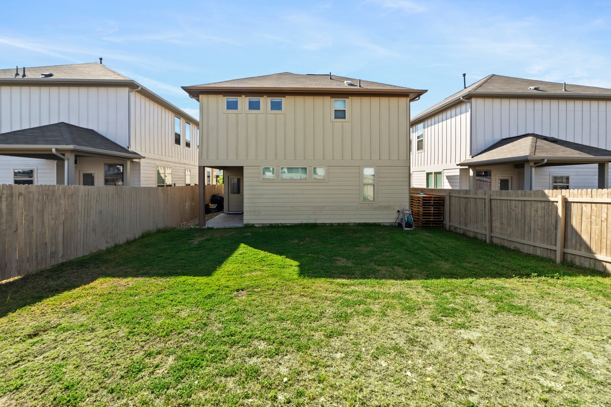 159 MacArthur Drive Leander, TX 78641 - Photo 30 of 31 a front view of a house with a yard