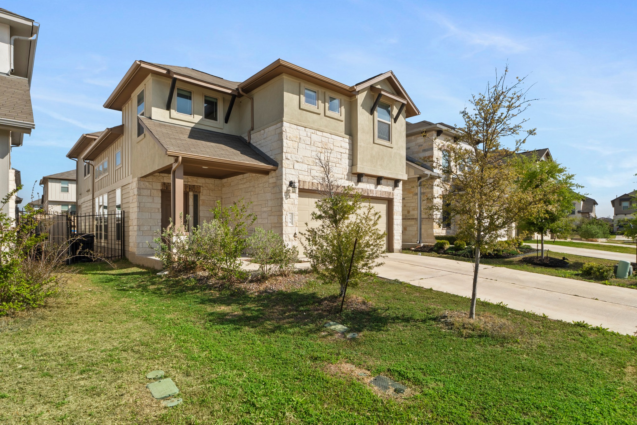 159 MacArthur Drive Leander, TX 78641 - Photo 4 of 31 a front view of a house with a yard