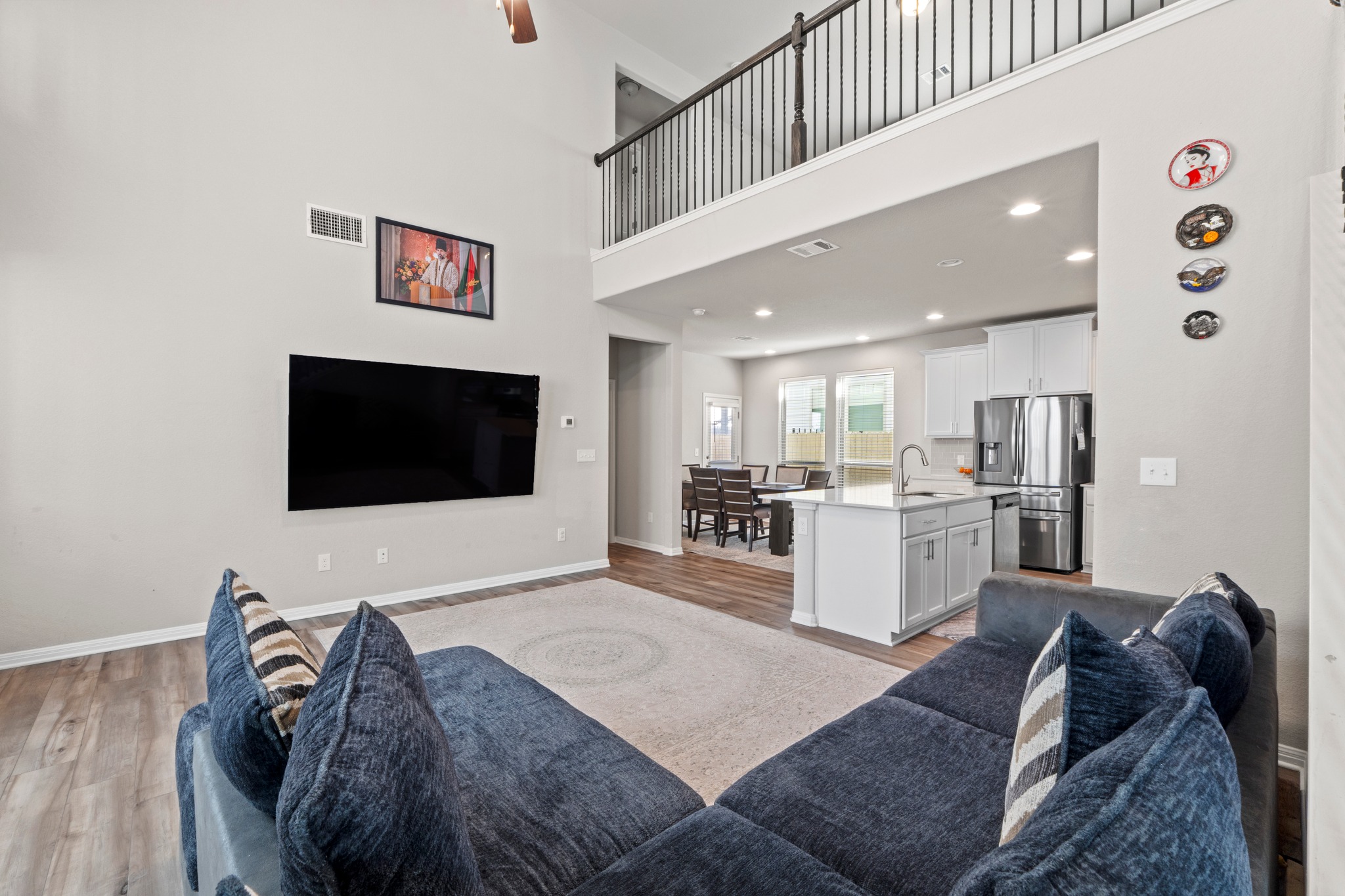 159 MacArthur Drive Leander, TX 78641 - Photo 5 of 31 a living room with furniture and a flat screen tv