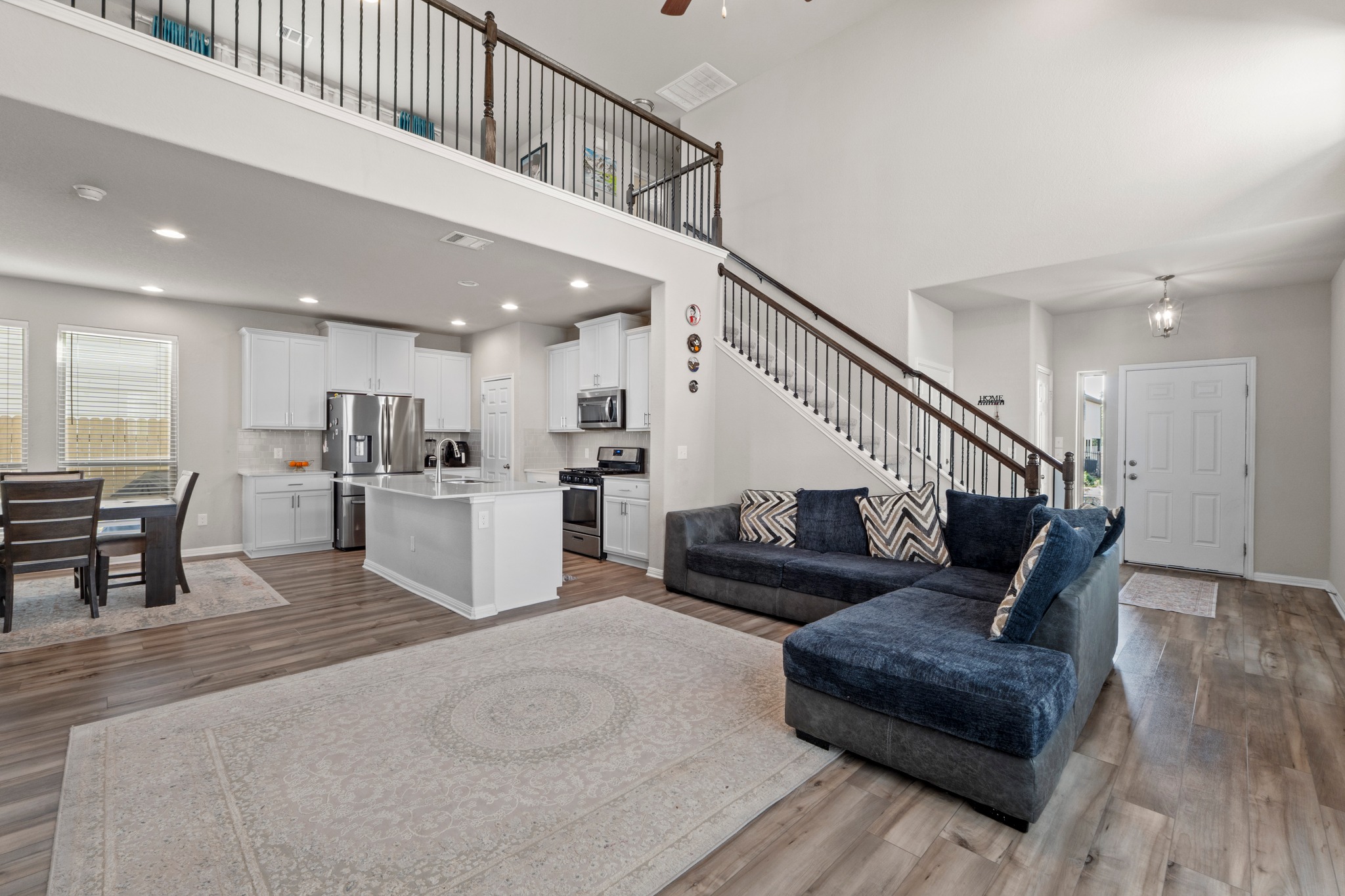 159 MacArthur Drive Leander, TX 78641 - Photo 6 of 31 a living room with furniture and kitchen view