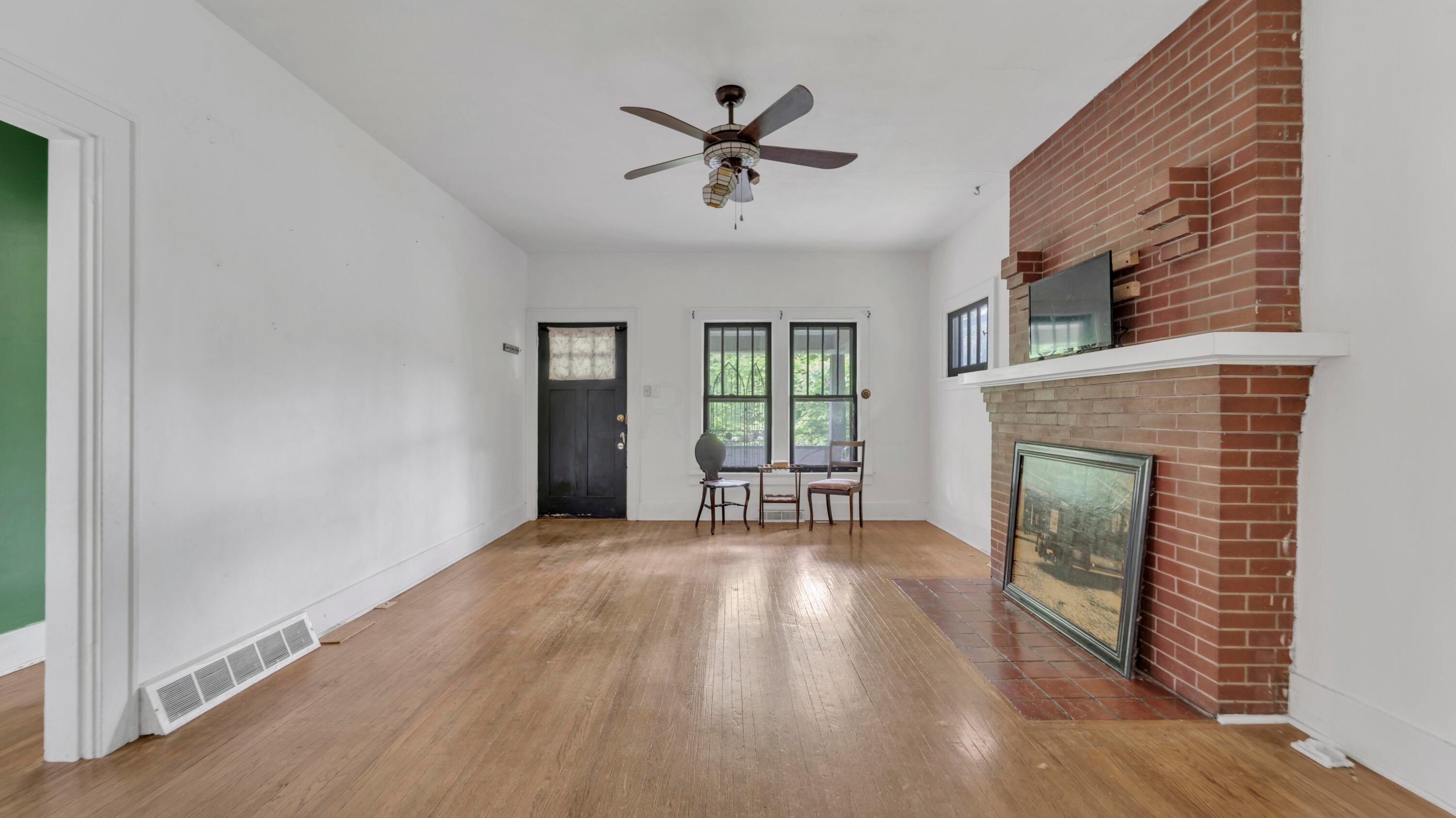 7979 Dublin Road Dublin, OH 43017 - Photo 8 of 40 Tall Ceilings, Windows & Hardwoods!