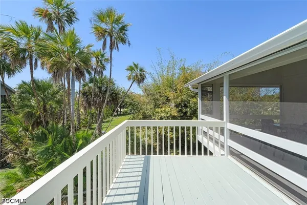 a view of balcony with small garden