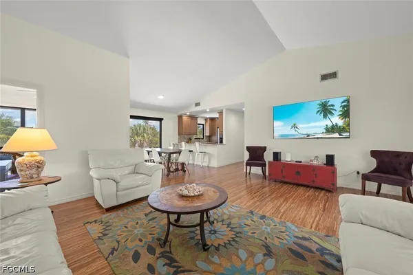 a living room with furniture and a table