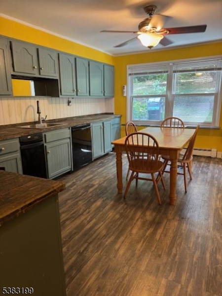 382 Howard Boulevard Mount Arlington, NJ 07856 - Photo 16 of 23 a kitchen with a wooden table and chairs