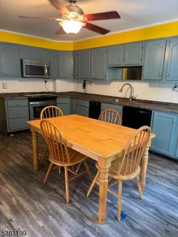 a table and chairs in a kitchen