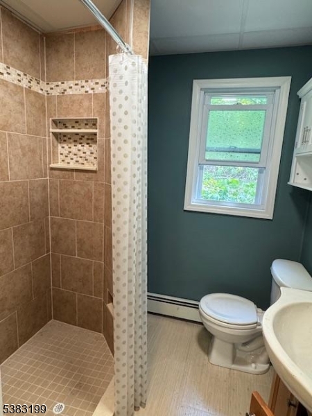 382 Howard Boulevard Mount Arlington, NJ 07856 - Photo 22 of 23 a bathroom with a toilet and a shower
