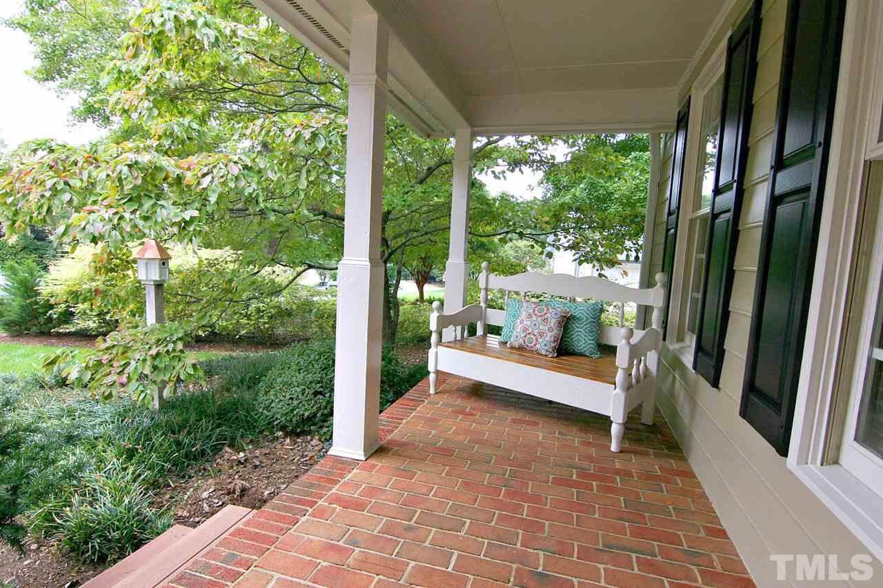7903 Laurel Mountain Road Raleigh, NC 27613 - Photo 2 of 25 Brick Flooring adds Tons of Charm to the Front Porch