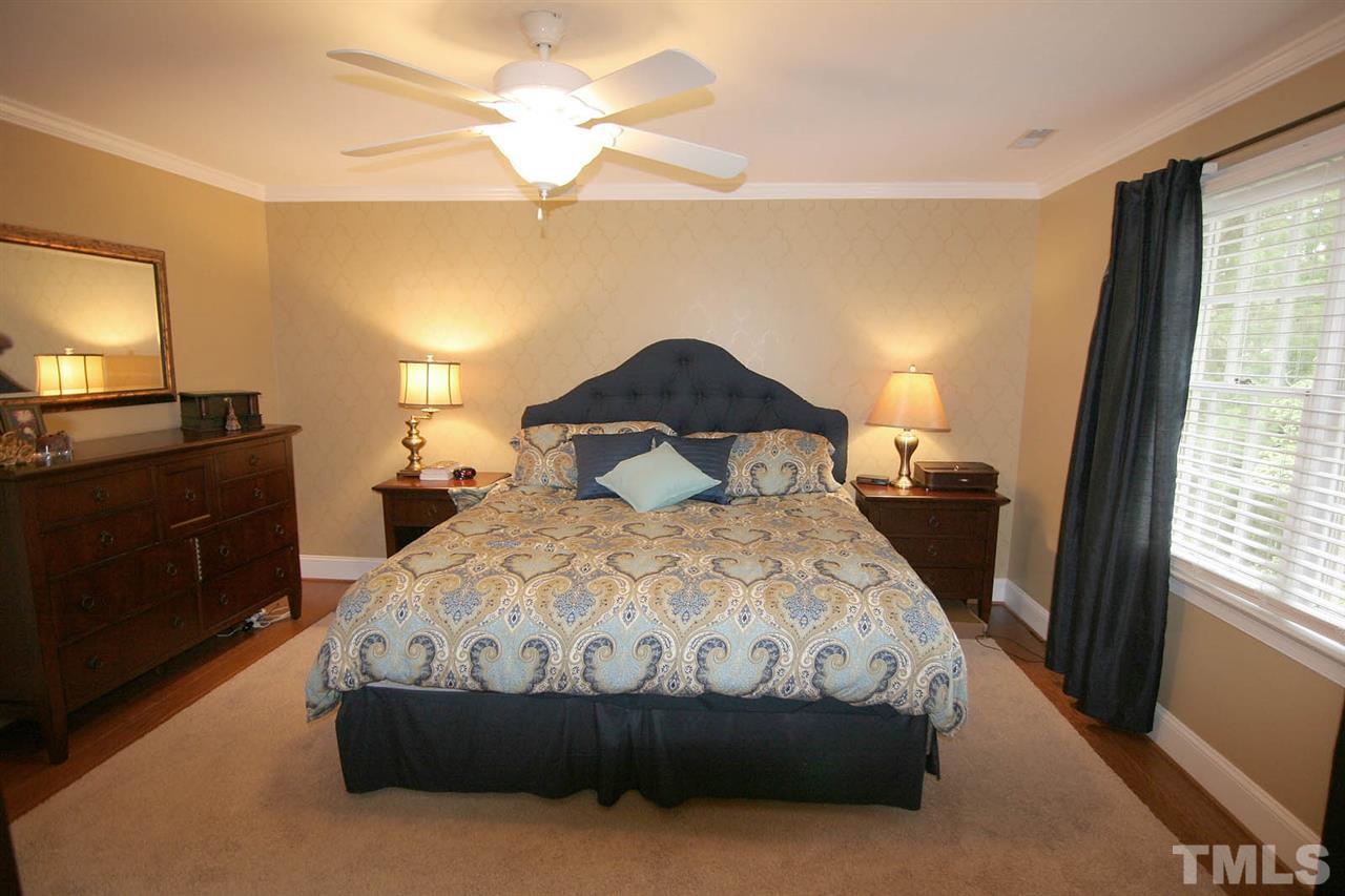 7903 Laurel Mountain Road Raleigh, NC 27613 - Photo 16 of 25 This is undoubtedly the PERFECT Place to End your Day. Hardwood Floors, Crown Molding, His and Her Closets -- One is a Walk-in Closet and the other is a Double Closet.