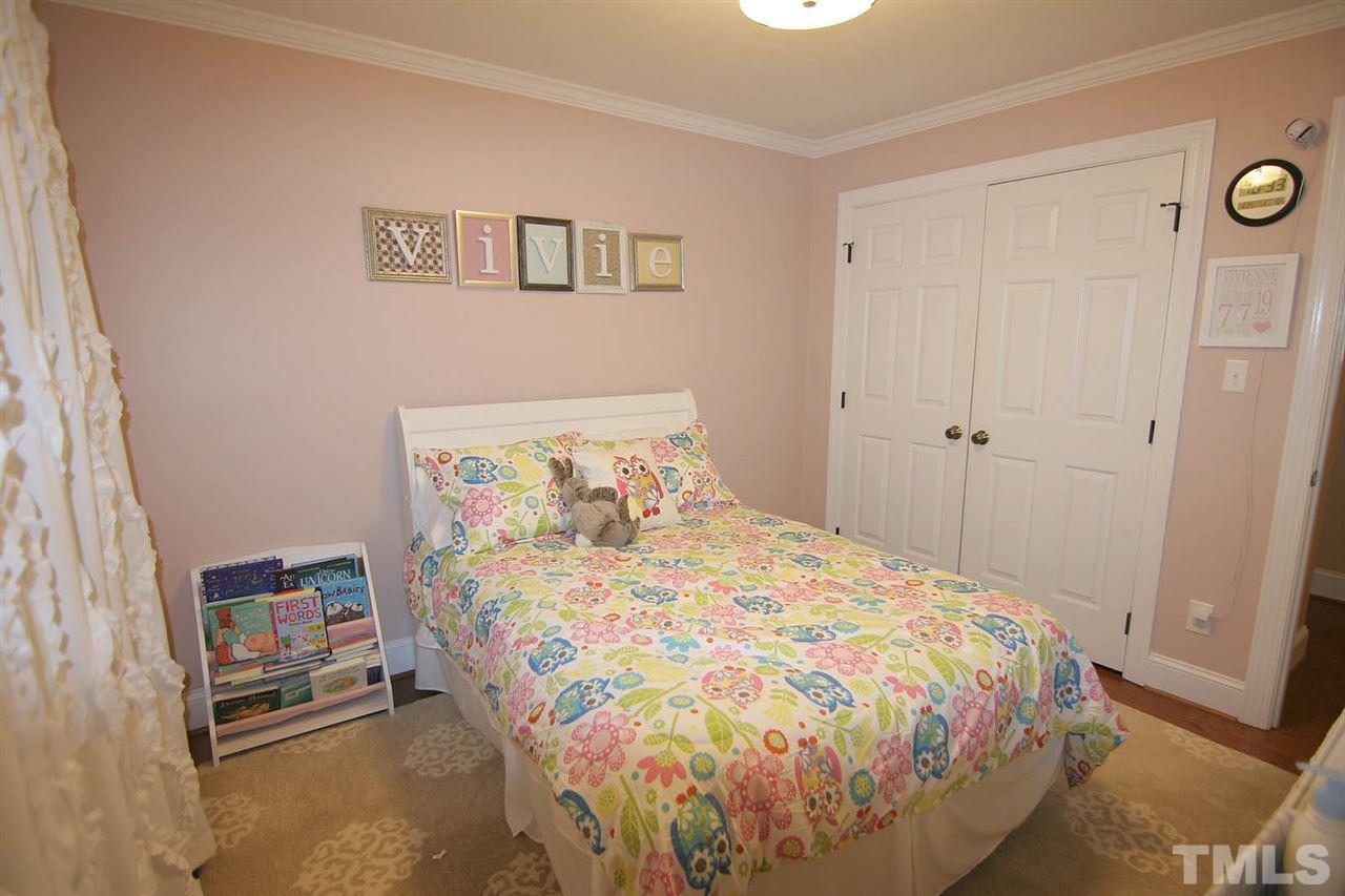 7903 Laurel Mountain Road Raleigh, NC 27613 - Photo 19 of 25 Secondary Bedroom has Hardwood Floors & Double Closet
