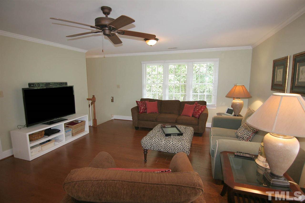 7903 Laurel Mountain Road Raleigh, NC 27613 - Photo 23 of 25 Bonus Room has abundant Windows to let in the Sunshine. Access includes Bonus Staircase from 1st Floor + Hallway Entrance from Second Floor.