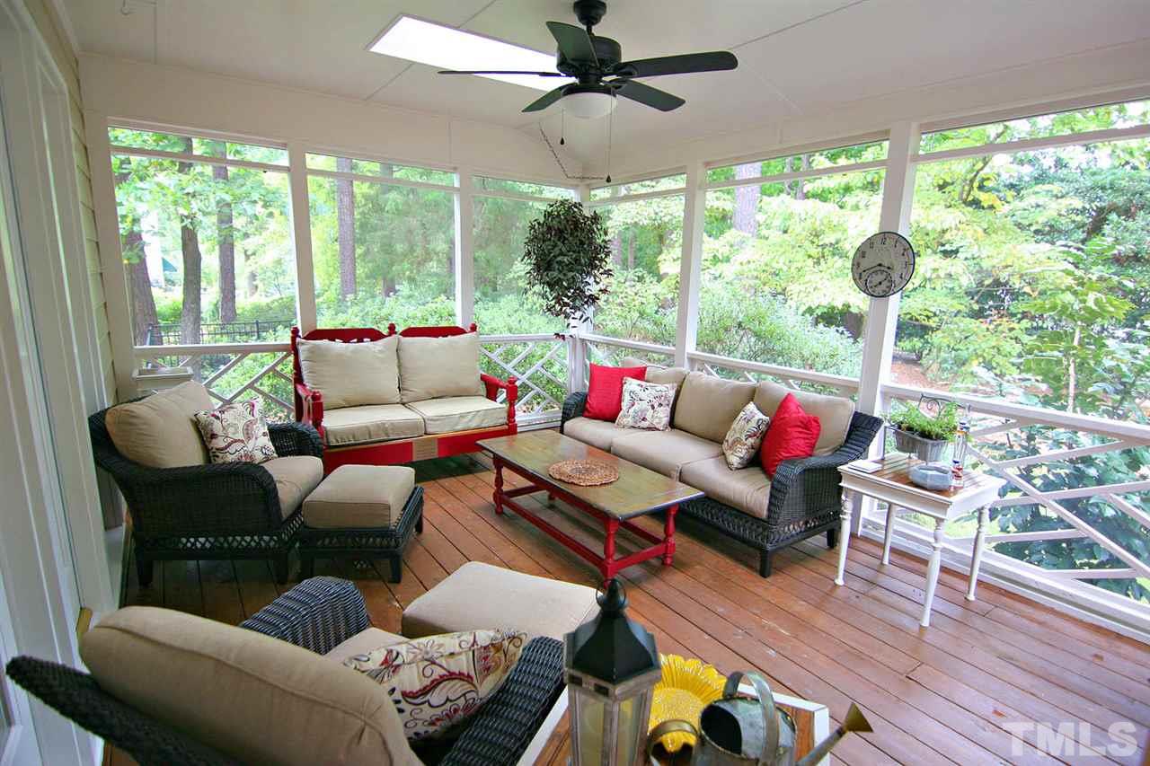 7903 Laurel Mountain Road Raleigh, NC 27613 - Photo 4 of 25 Oversized Screened Porch is the Perfect Place to Relax and Enjoy your Morning Coffee or Afternoon Beverage ... Overlooks Private, Wooded Backyard