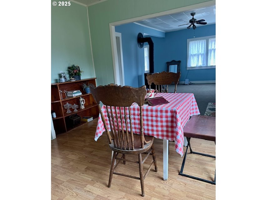 62254 Wallowa Mtn Loop Road Joseph, OR 97846 - Photo 29 of 35 a view of a dining room with furniture and wooden floor