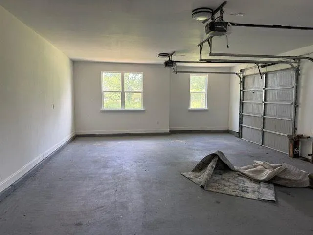 an empty room with windows