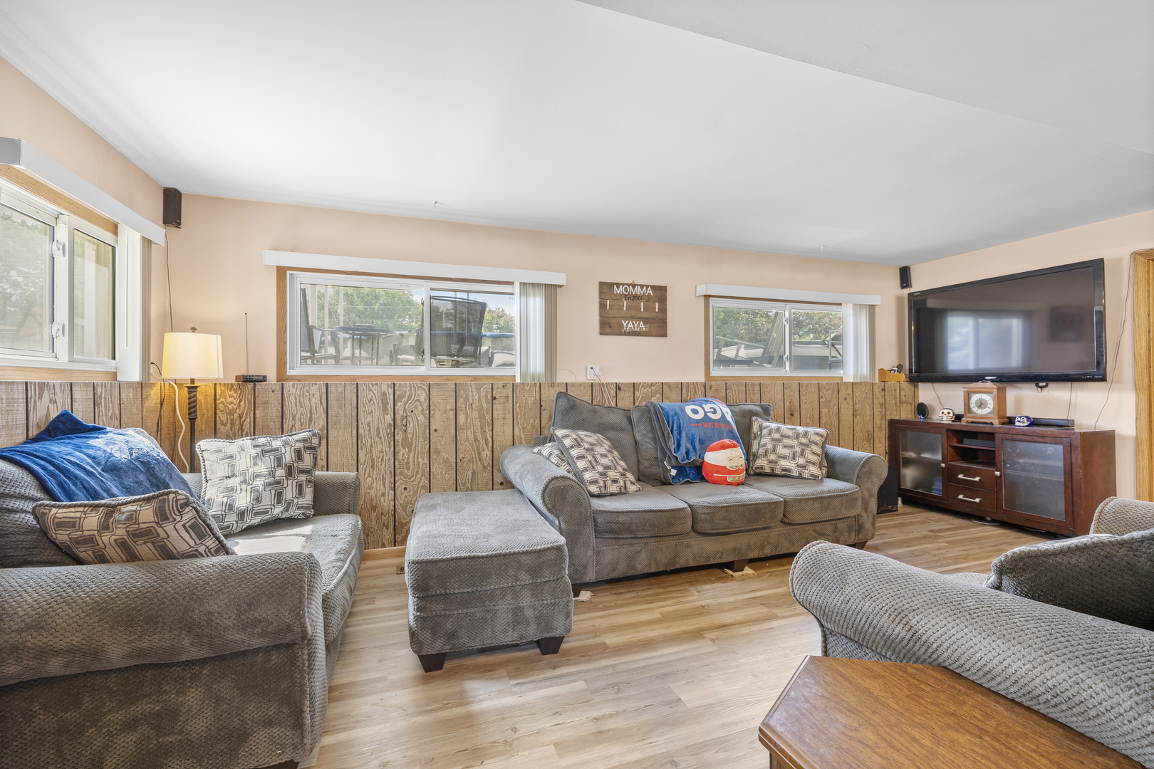 4 Saugatuck Road Montgomery, IL 60538 - Photo 4 of 24 a living room with furniture and a flat screen tv