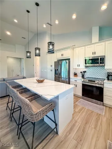 a dining room with furniture window wooden floor