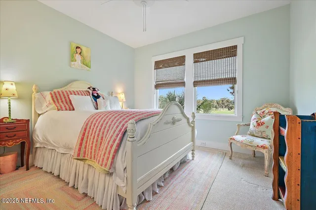 a bed room with a bed and a couch