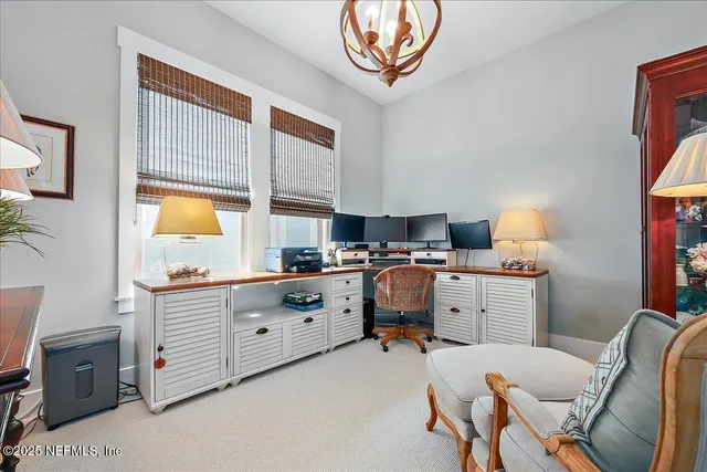 a room that has a chair and a table in it