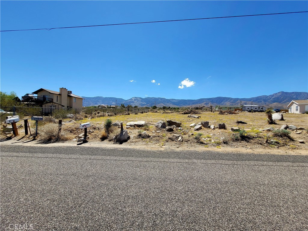 1 Carnelian Road Lucerne Valley, CA 92356 - Photo 1 of 1 a view of a road with an ocean view
