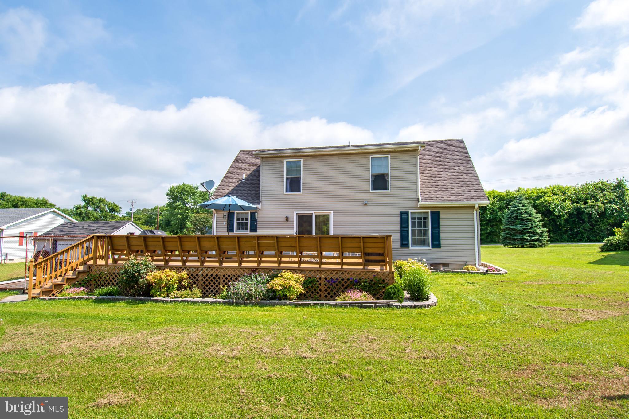 23015 Bay Shore Road Chestertown, MD 21620 - Photo 9 of 35 Large deck.. nice landscaping