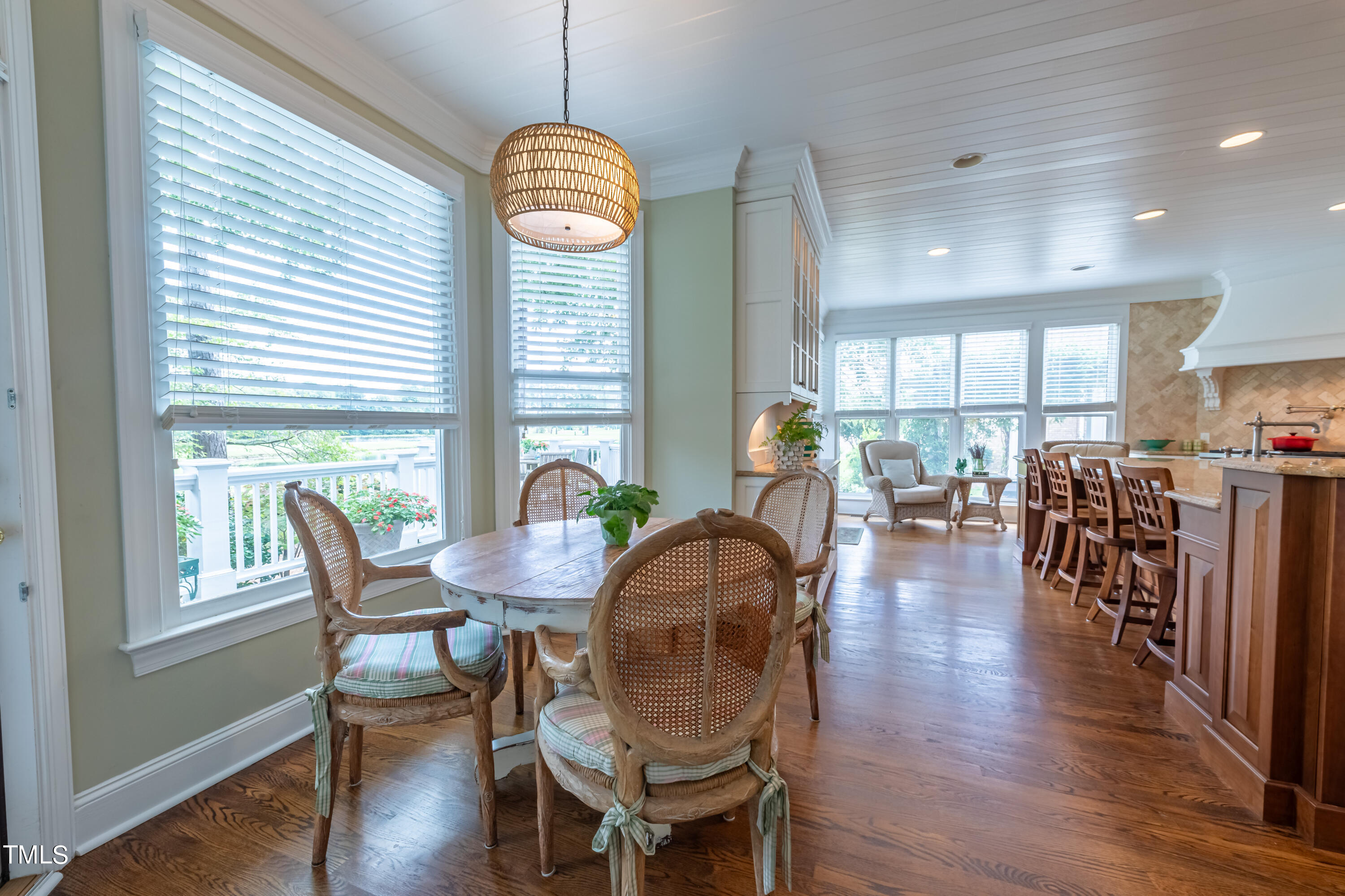 103 Declair Court Cary, NC 27513 - Photo 14 of 47 a view of a dining room with furniture window and wooden floor